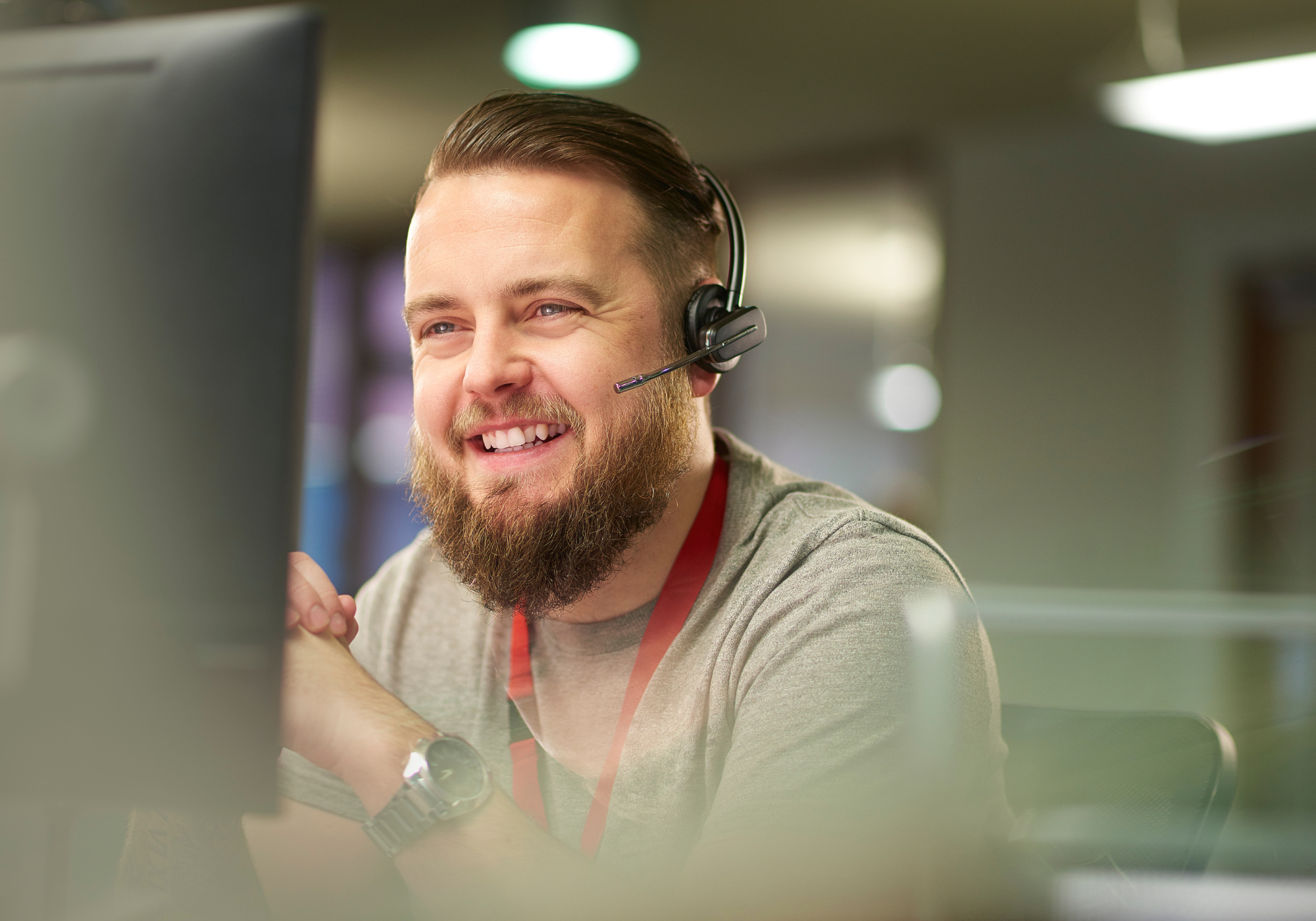 A friendly Police Credit Union staff member assisting a member with their account needs.